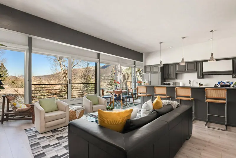 The open concept and cozy spaces in this rental allow for plenty of relaxing and enjoying time together during your trip to Aspen.